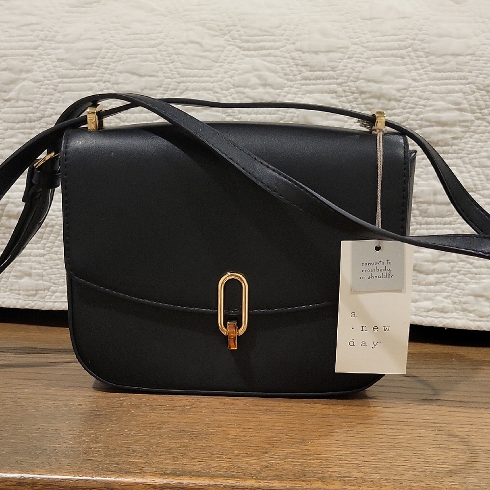 A New Day Black Crossbody Bag with Gold Hardware and Structured Design